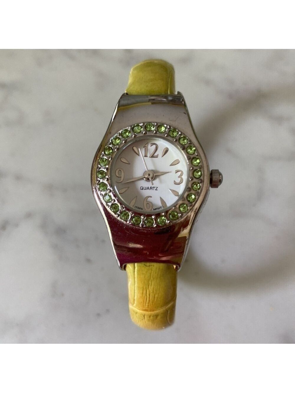 Avon Light Green Silvertone Hinge Cuff Watch with Crystal Detail